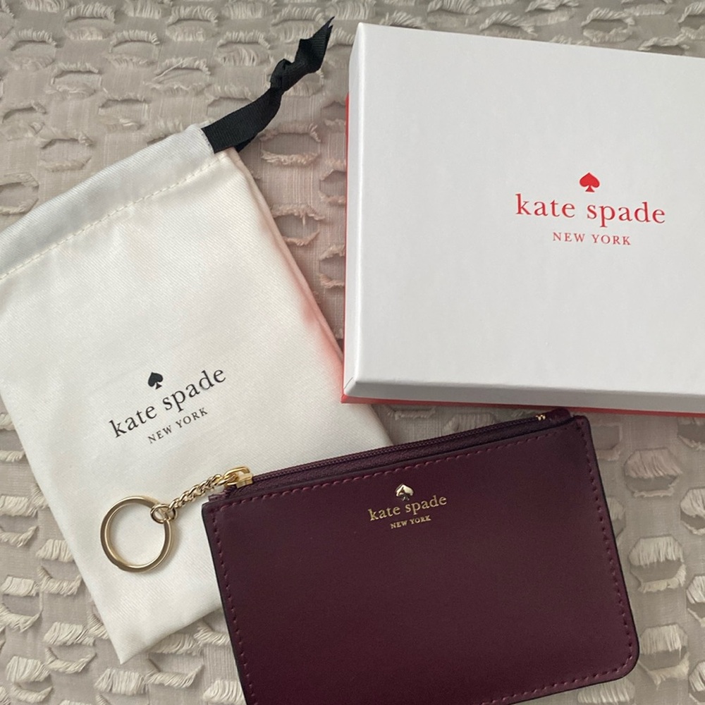 Kate Spade Deep Plum Zipper Wallet/Key Chain. Comes with dust bag and box.